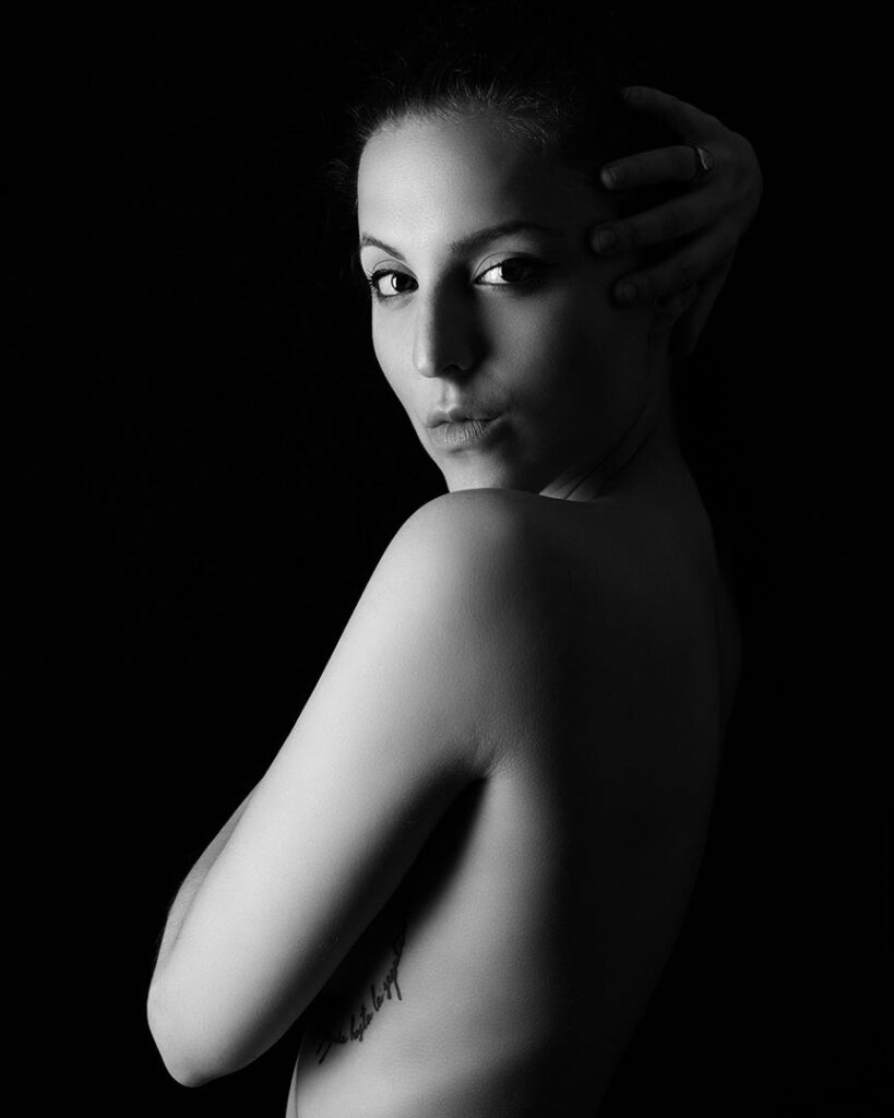 Portrait of a woman in low-key fine art lighting